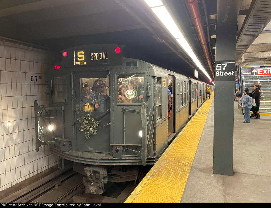 Holiday Arnine consist stopped at 57th St Station on the F Line